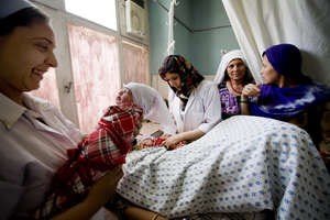 Midwife with a Newborn Baby