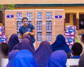 EMCR member addressing girls