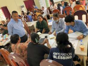Training participants engaged in discussion