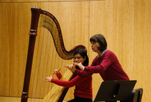 Nancy Allen demonstrates during Harp Masterclass.