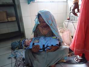 Mother with her baby in Raebareli clinic