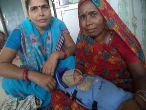 Mother with her premature infant