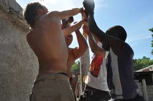 Volunteers working to build classrooms