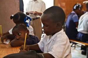 A happy child in school, thanks to you!