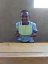Proud of his passing grade!