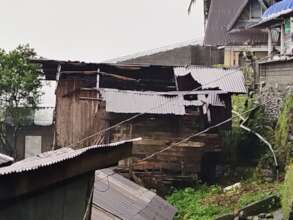another damaged house among the many
