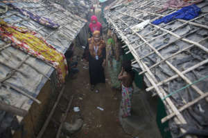 Female volunteers inform women about safe spaces