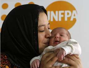 Nisreen and her baby boy Mohammed