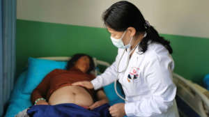 Dr. Cairen provides prenatal care to a patient.