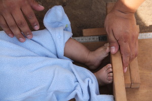Beautiful feet! Measuring babies takes accuracy.
