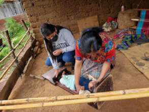 Measuring growth during a nutrition visit.