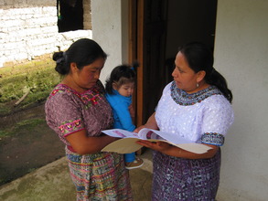 Yoli, our health educator talking with a mom