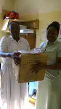 Health clinic receiving birthing kits