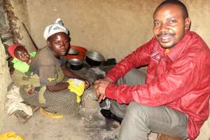 Dr Luc visiting a pigmie woman in her home