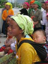 Mother with her baby born with a birthing kit