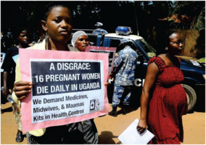 Ugandan woman demonstrating