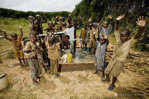 Children in Rwanda celebrate clean drinking water