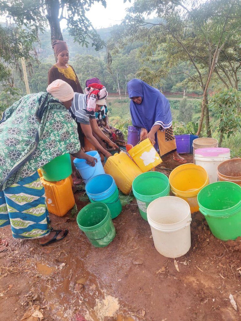 Women of Igoji Collect Water From Well