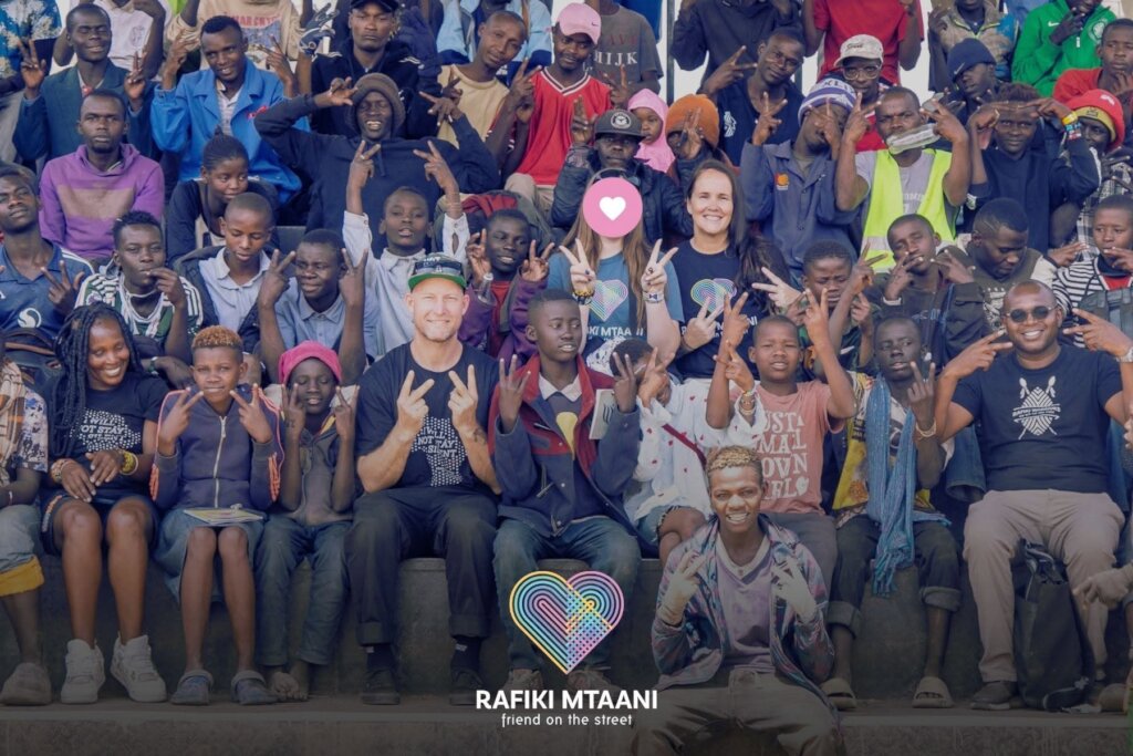 Sarah with family at Rafiki Mtaani