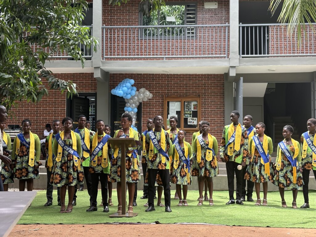 Our graduates holding a speech