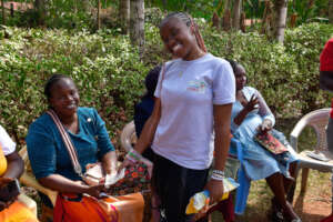 Youth handing out Angel Wings Kits