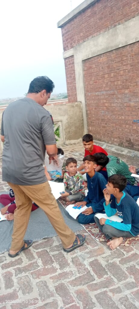 guide star team with children distributing food