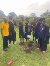 WOW 9 planting mango tree to mark their graduation