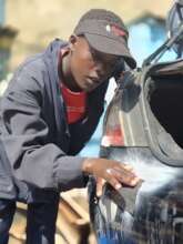 Maria training to be a mechanic