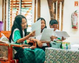 Girls enjoying a new built classroom.