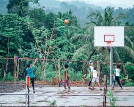 Boys enjoying new basketball court