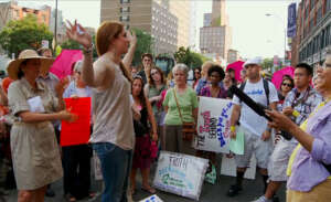 Danielle protesting, from Tricked