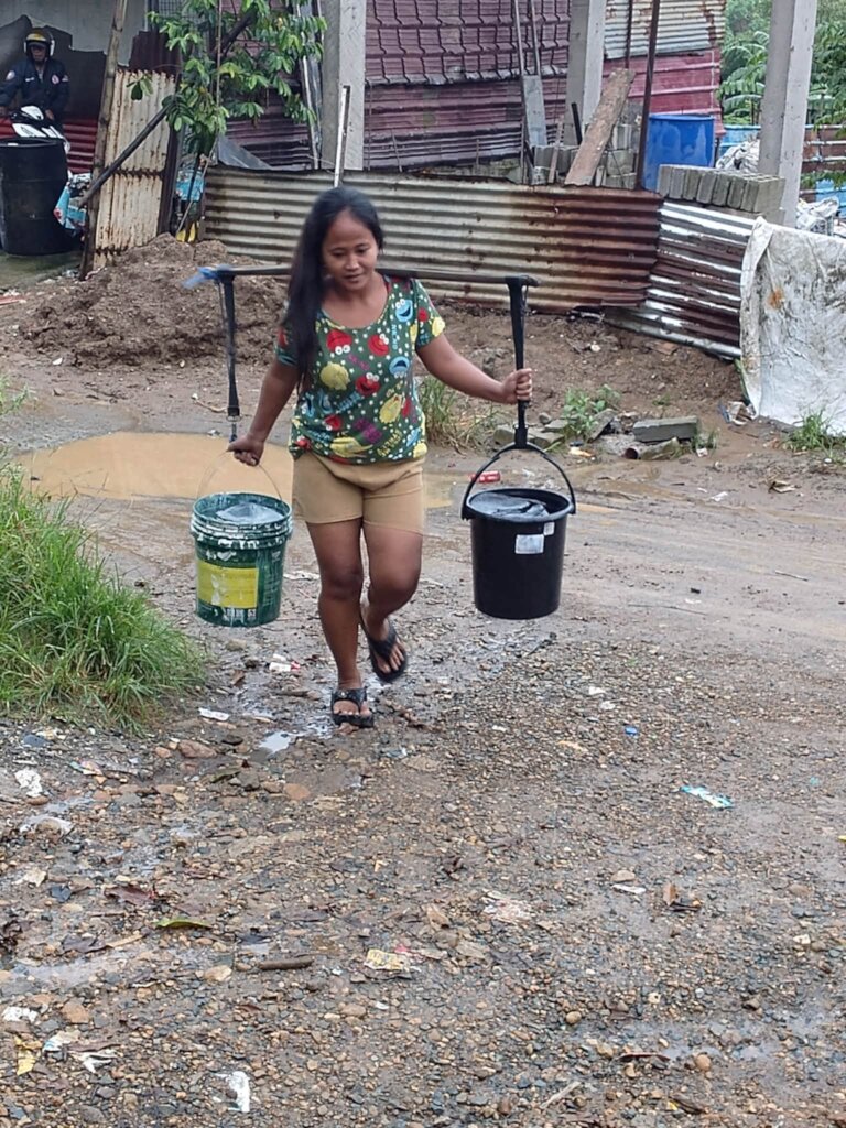 The teacher and parents working together to clean