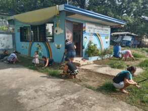 Mothers of students clean child-care center