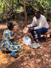 A widow in Bufuula Village, getting a xmas hamper