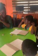 Children receiving reading support after school.