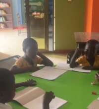 Children receiving reading support after school.