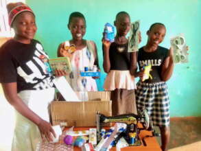 Girls Receiving Sewing Supplies