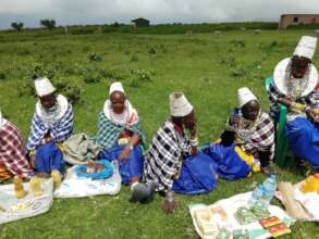 Ladies Selling at the Market in Alcheniomelock