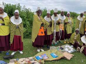 Loan Recipients at a Market in Alcheniomelock