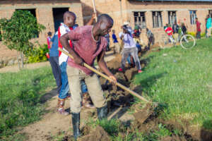 Community members working to improve school WASH