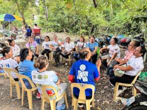 Americares leads a mental health group session