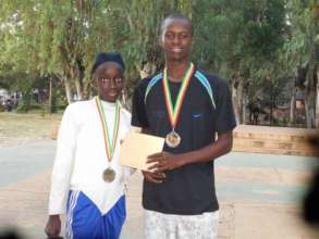 Diakassan receiving silver medal