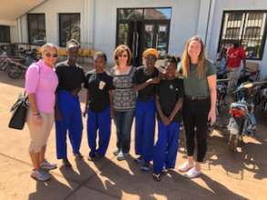 ACFA board members meet ACFA's children