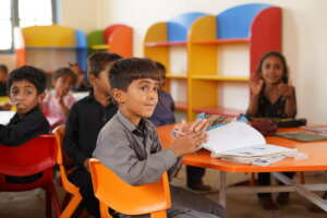 Students study at the new school in Pakistan.