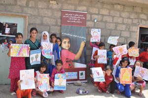 Girls with their drawings
