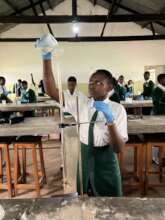 Ssaku student using TGUP's Science Lab in a Box