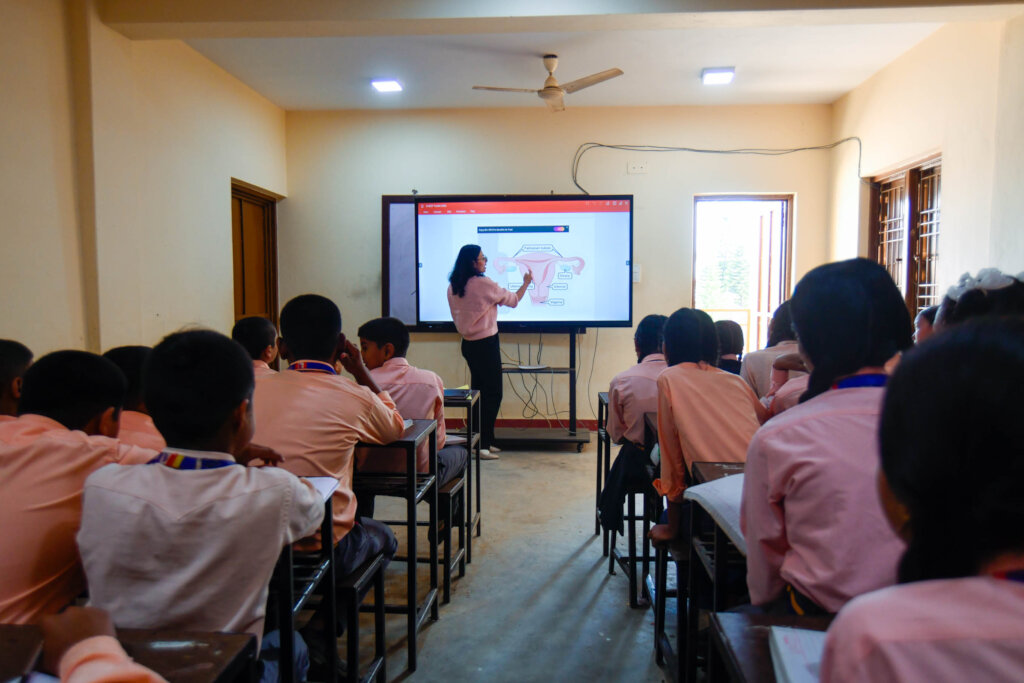Nepali team member teaching students Jan 2026