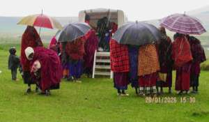 Women attend mobile clinic despite heavy rain