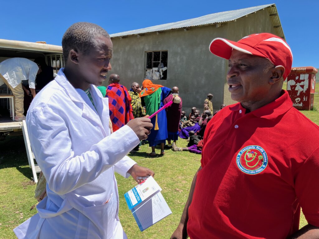 Leshengay and Dr. Shemaghembe at mobile clinic
