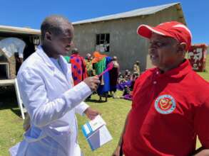Leshengay and Dr. Shemaghembe at mobile clinic